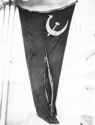 Soviet flag (pennant) captured in battle at Ourosozeros 11 April 1919 by Canadians & Col. Leckie's Soviet Mosin 1891 rifle. Soviet flag (pennant) captured in battle by Canadians & Soviet Mosin 1891 rifle
