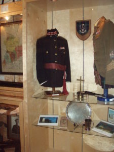 Case 4 - Seaforth Museum - Tunics of Cadet RSM and Regimental Pipe Major.