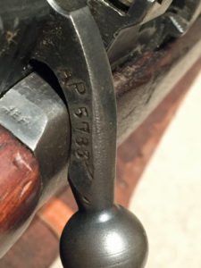 Inspector's marks on top of body on each side of the bolt.