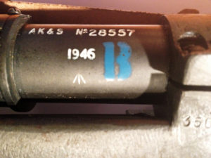 No. 32 MK. III scope. Maker AK&S. Serial number 28557. Blue "B" "Bloomed" mark seen on many Mark 3 scopes. Also the year 1946, the " /|\" British issue mark.