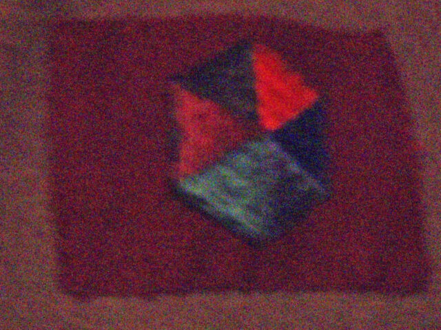 Greatcoat of Major General Bert Hoffmesiter. Formation patches on the greatcoat of Major General Bert Hoffmesiter. The maroon rectangle ifs 5th Canadian Armoured Division (nicknamed "Hoffy's Mighty Maroon Machine") and the multicoloured patch shows that he volunteeredfor the Canadian Army Pacific Force to fight the Japanese.