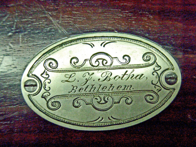Silver escutcheon on s very rare Boer Sporting Mauser 1896 "Pleizier" with escutcheon for "L.F. Botha Bethlehem" A very rare Boer War military rifle and possibly that of General Louis Botha., the famous Commando leader. Silver escutcheon on s very rare Boer Sporting Mauser 1896 "Pleizier" with escutcheon for "L.F. Botha Bethlehem" A very rare Boer War military rifle and possibly that of General Louis Botha., the famous Commando leader.