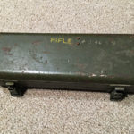 British No. 8 MK. I stell case for No. 32 Telescope showing the rifle serial number (AU9099) stencilled on top.