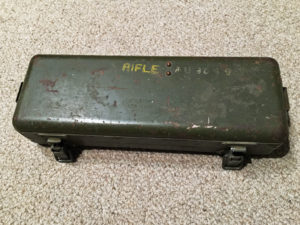 British No. 8 MK. I stell case for No. 32 Telescope showing the rifle serial number (AU9099) stencilled on top.