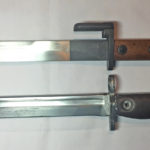 FN X2 E1 bayonet on top and FN C1 bayonet below.