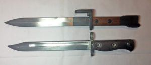 FN X2 E1 bayonet on top and FN C1 bayonet below.