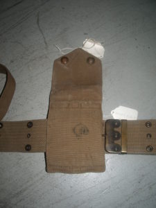 1914 MILLS webbing set for Colt 1911 Commercial pistol, one of 5,000 purchased by Canada in 1914, serial number C13085. Back view of the magazine pouch showing the Canadian issue mark C/|\