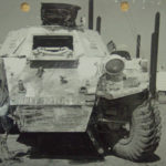 View of front of a Ferret Scout Car after a mine blew the front right wheel off.
