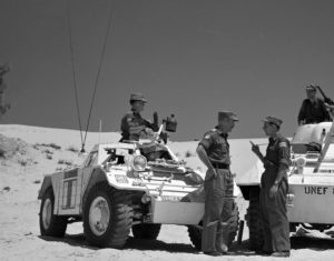 Ferret UNEF 1221 & Yugoslav M8 UNEF 863 parked in the desert for a meeting. DETAIL (DND ME-1215 CFJIL)
