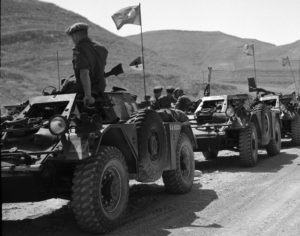 parked convoy of Canadian Ferret Scout Cars.