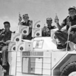 Soldiers in Ferret UNEF1209 loading cases of Carling beer onto their Ferret. (RCD Archives)