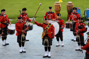 Drum Major raises his mace.