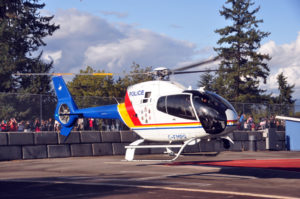 RCMP helicopter landing at Swangard Stadium.