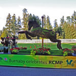 Burnaby parade float with carousel horse covered in living plants. (?)(D90 074)