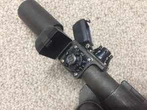 M84 sniper scope SN 16559 & mount for M1D Garand - turret caps. These may be replica.