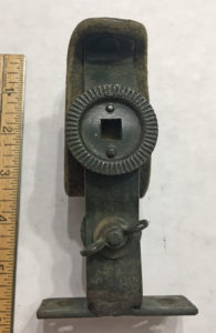 A rare original WWII SAS, Airborne or LRDG weapons clip for jeep as mounted on a front fender. Made from a converted British bicycle weapons clip.
