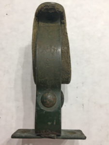 A rare original WWII SAS, Airborne or LRDG weapons clip for jeep as mounted on a front fender. Made from a converted British bicycle weapons clip.