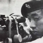 Gurkha sniper aiming his L42A1 sniper rifle.