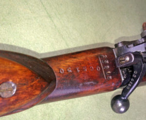 Lee-Enfield No. 4 MK. I ( T) sniper rifle made by Stevens-Savage 0C5130. This one was fully converted to sniper, was used, and went through Factory Thorough Repair (F.T.R.) in the UK after WWII. - markings on top of butt. and rear of bolt handle.