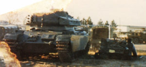 Ferret 54-82578 after destruction in a hanger firer - to right of a Centurion tank that was also burnt I believe.