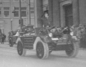 Ferret 54-82563. in Remembrance Day Parade 1956. Major General Chris Vokes is taking the salute. Marching troops are Royal Canadian Army Cadets or Milita, not Regular Force. Detail showing 54-82563. [LdSH(RC) Archives]