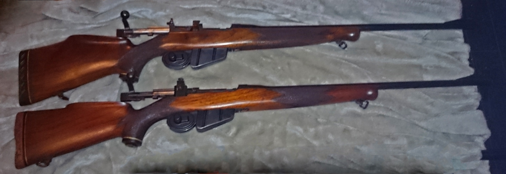 Two very unusual Long Branch rifles. The top one is serial number J-5550-16 and has a mid-war 2-position "L" backsight. The lower rifle has no serial number and is very similar but had a target back sight fitted.