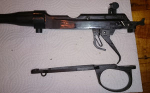 Second rifle which has no serial number. Left side with wood furniture removed.
