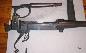 Second rifle which has no serial number. Right side with wood furniture removed.