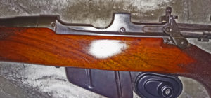 Rifle serial number J-5550-16 and has a mid-war 2-position "L" backsight. Left side with the action in the stock.