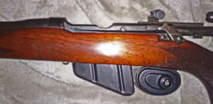 Second rifle which has no serial number. Left side with wood furniture in place.