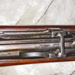 Rifle serial number J-5550-16 and has a mid-war 2-position "L" backsight. View from above. Note the serial number "J-5550-16" at the left.