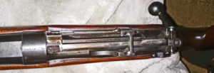 Rifle serial number J-5550-16 and has a mid-war 2-position "L" backsight. View from above. Note the serial number "J-5550-16" at the left.