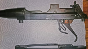 Rifle serial number J-5550-16 and has a mid-war 2-position "L" backsight. Left side showing the special trigger hung from the body instead of the trigger guard.