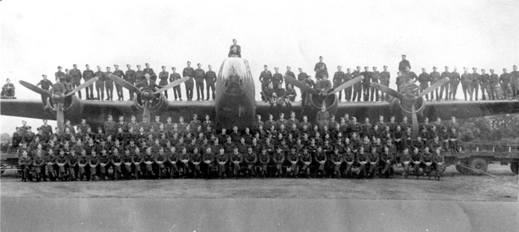 424 Sqn RCAF members on a Halifax bomber. Circa 1944. 