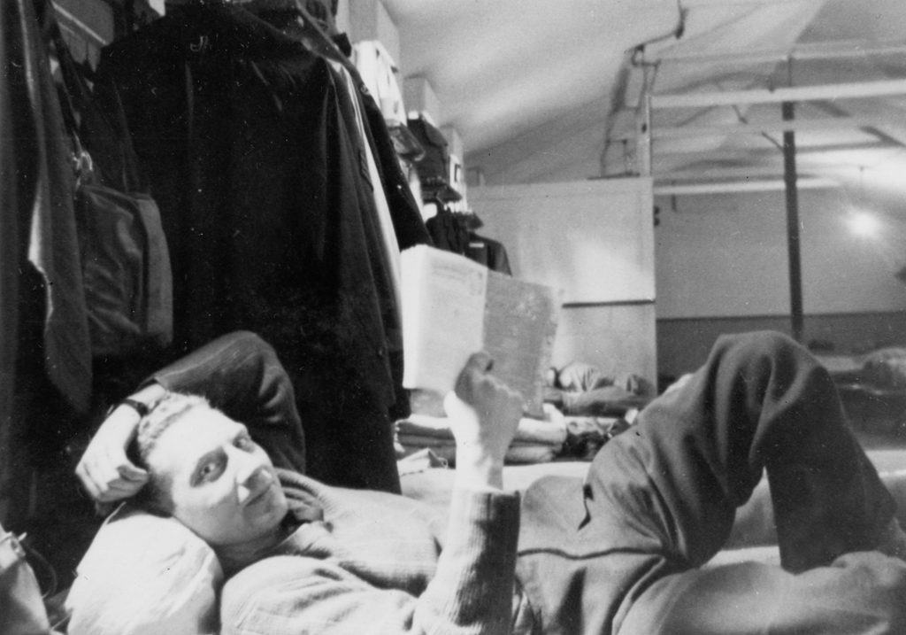 Pilot Herb Kirkly aka Kirk lying on his cot. 