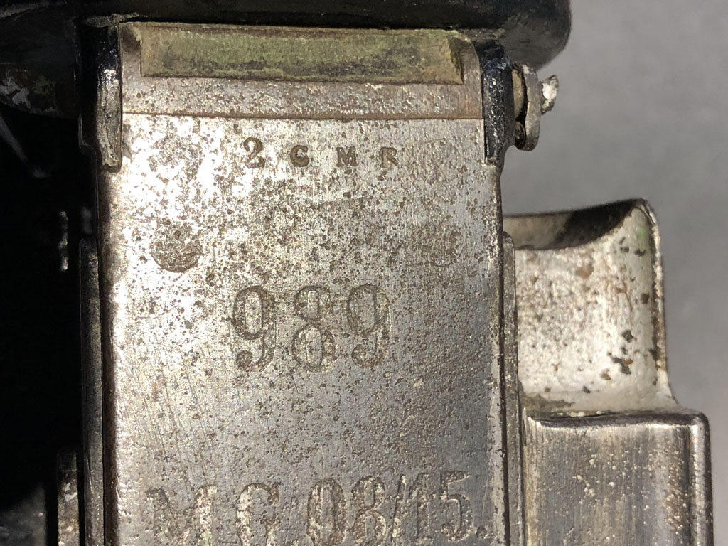 MG 08-15 989 showing the "2 C M R" capture marking stamped over the German serial number.