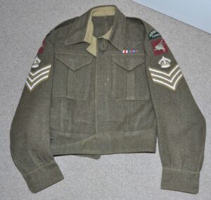 Battledress blouse Staff Sergeant, Airborne Canada. Found with the U.S. Parachutist Jacket and presumably from the same man. As found. Parachute badge had been removed. A replacement (age not guaranteed). MOTH DAMAGE to front of blouse.