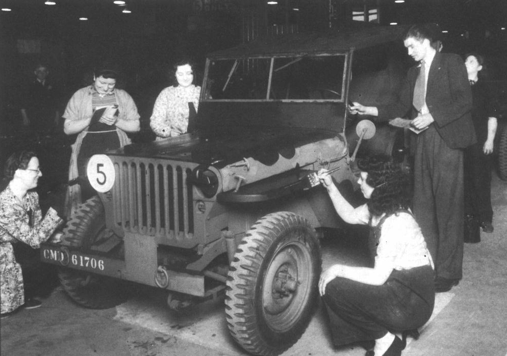 Canadian Contract CDLV-505 Car 5 Cwt. right after being assembled and painted at Tom Garner Ltd 'Olympia' Manchester England facility. Staff are posed as if applying Mickey Mouse Ear camouflage. September 1942 (as published by the late Bart Vanderveen in his Wheels & Tracks magazine issue # 1 p 16)