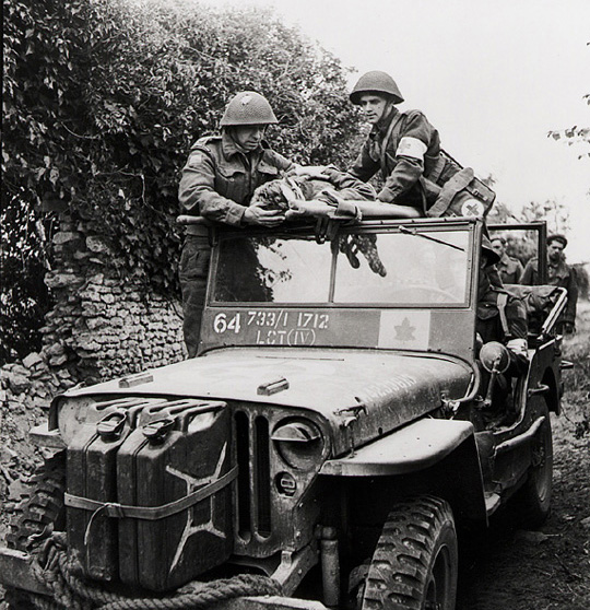 Canadian Army Ford GPW ambulance in Normandy. (Library and Archives Canada PA-140192 - cropped)