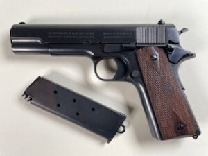 Colt Government Model 45 ACP made 1917 left side with magazine