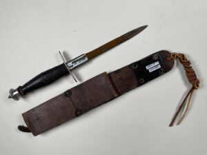 V-42 of known Sgt 1-1 FSSF man who was awarded the Silver Star for bravery at Anzio. - back view, scabbard folded.
