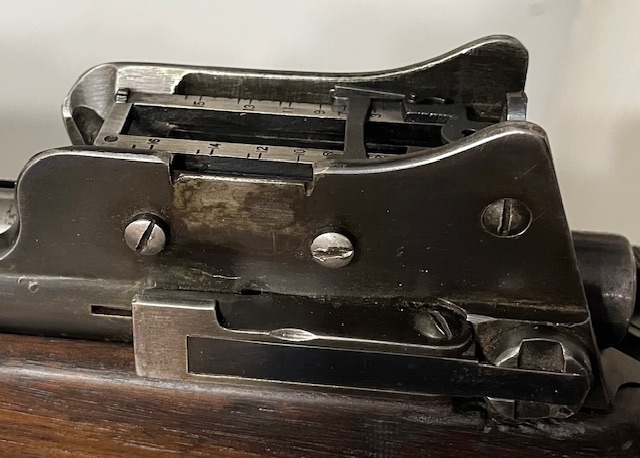 Pattern 1914 MkI* (T) W 191781 with Australian issue markings and number 248 - Left side of rer sight housing showing notch cut for rear scope mount. The two retaining screws for this mount were reinserted in this case. 