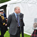 Victoria Highland Games 2013 150th (134) - HRH Prince Andrew reading plaque fore the 150th Anniversary that he had just unveiled.