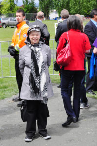 Victoria Highland Games 2013 150th (140) - Jeanette Stevens in foreground. Prinmce Andrew behind her in grey suit.