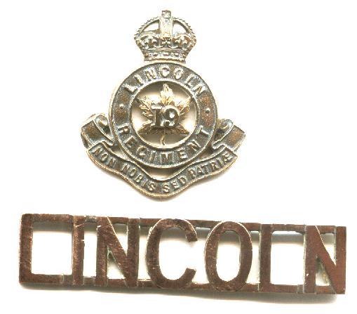 9th Lincoln Regiment collar & shoulder badges of Capt W A Stevens.