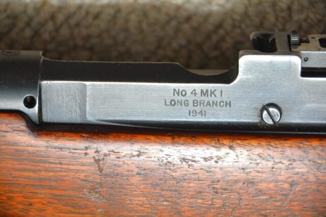 Long Branch 1941 with 1942 barrel all matching 1L314 - Left side view body showing Model maker location and year.