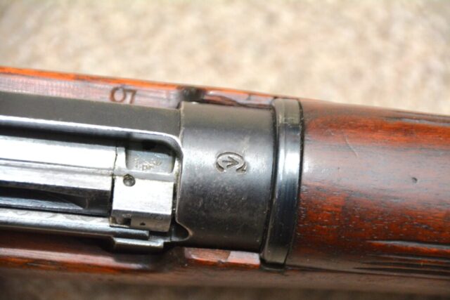 Long Branch 1941 with 1942 barrel all matching 1L314 - C/| on breech. A rare marking showing this rifle apparently reamained in Canadian service. "5" mark on wood.