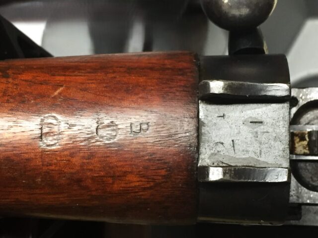 Long Branch 1941 with 1942 barrel all matching 1L314 - marking on underside of postol grip LB C/| and stadium with C/| and inspector's number. Trigger guard removed for photo.