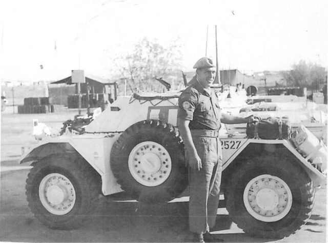 McNicholl Ferret photos – 54-82527 UNEF 1223 man standing blocking 54-8 white