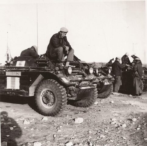 McNicholl Ferret photos – 54-82585 UNEF 1215 likely – man sitting on top green
